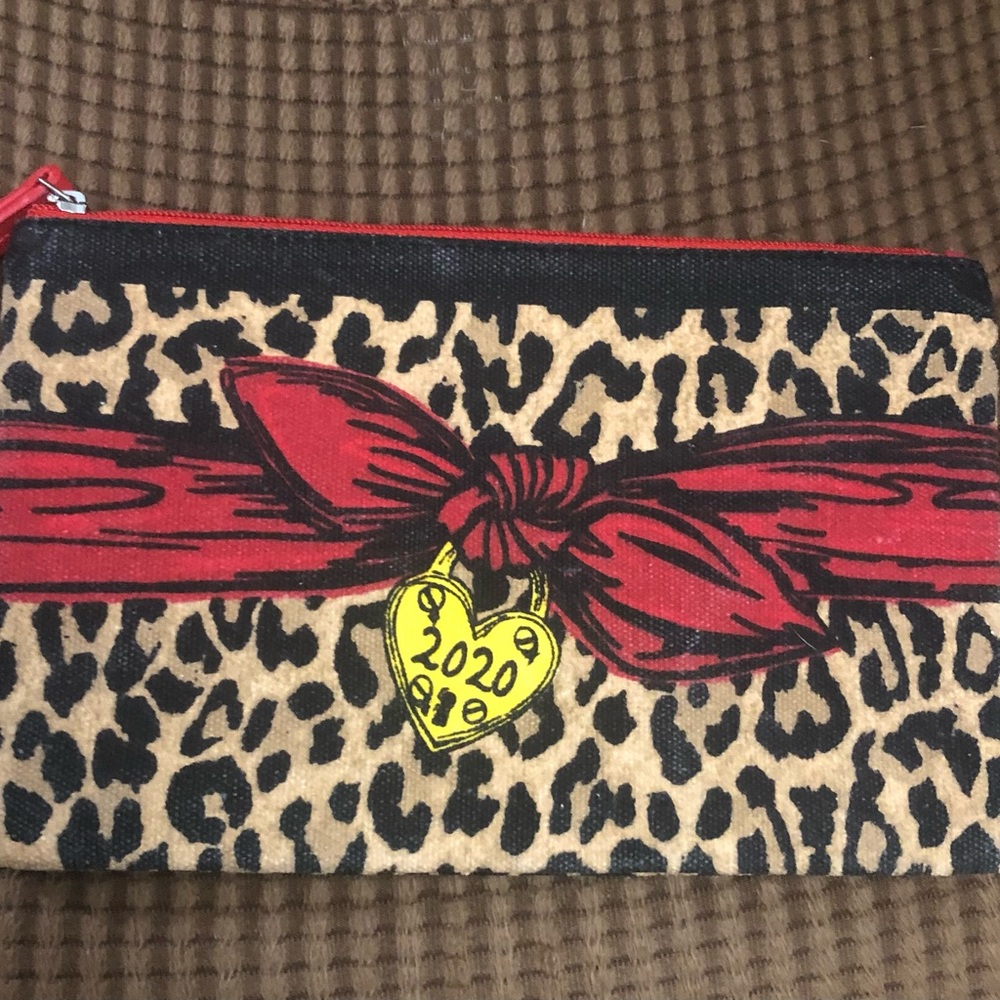 Leopard pouch new with out tag
